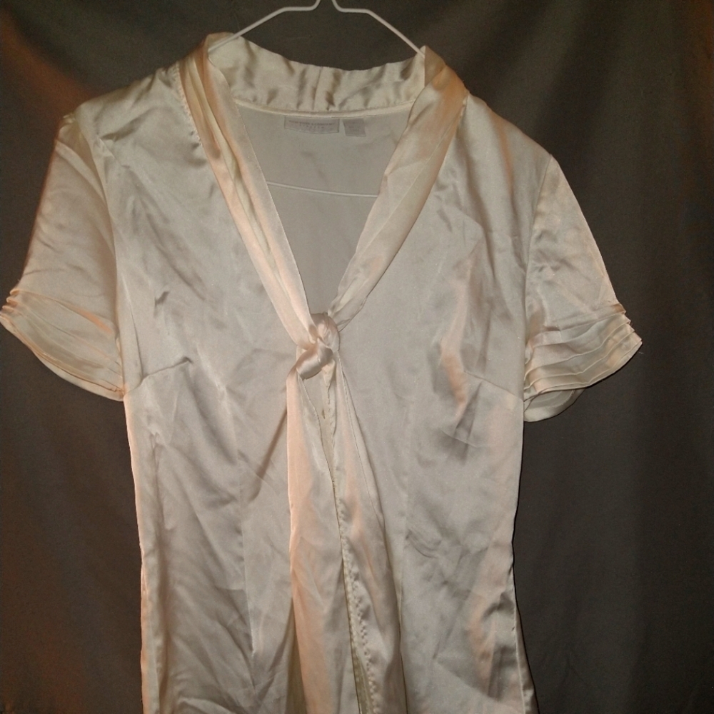 Off white polyester blouse with built in tie around neck.